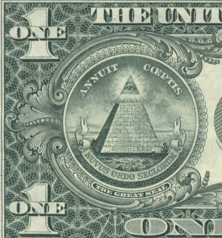 Dollar bill zoomed in on the Latin words